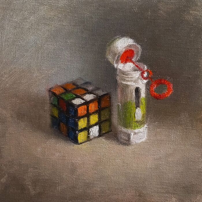 Oil painting of a Rubik's Cube and bubble wand symbolizes Eastern Europe’s collective nostalgia.