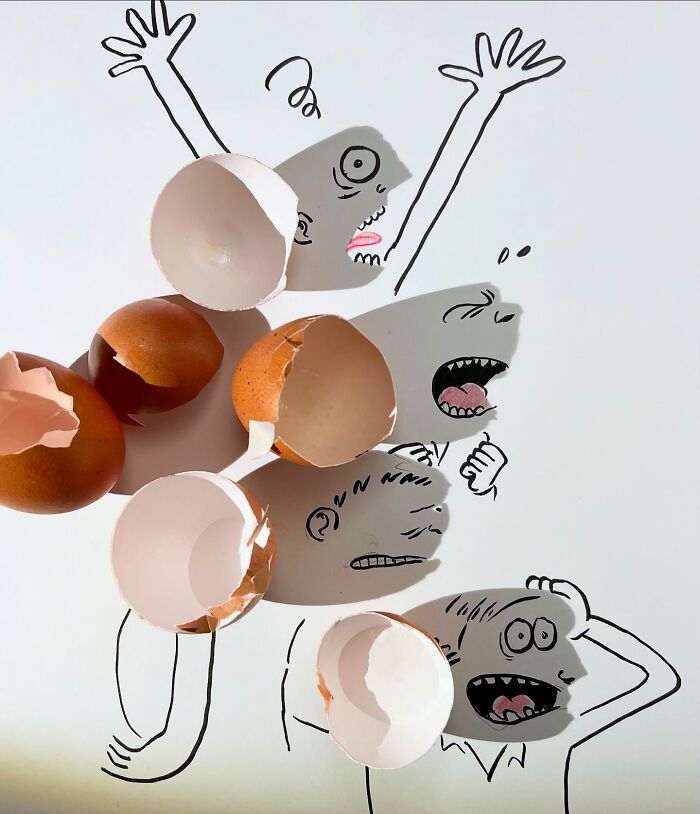 Shadows of eggshells used in creative illustrations by an artist.
