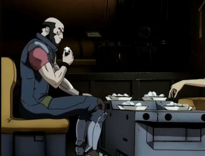 Animated character with robotic legs sitting and eating eggs, highlighting questionable movie details mocked by cinephiles online.