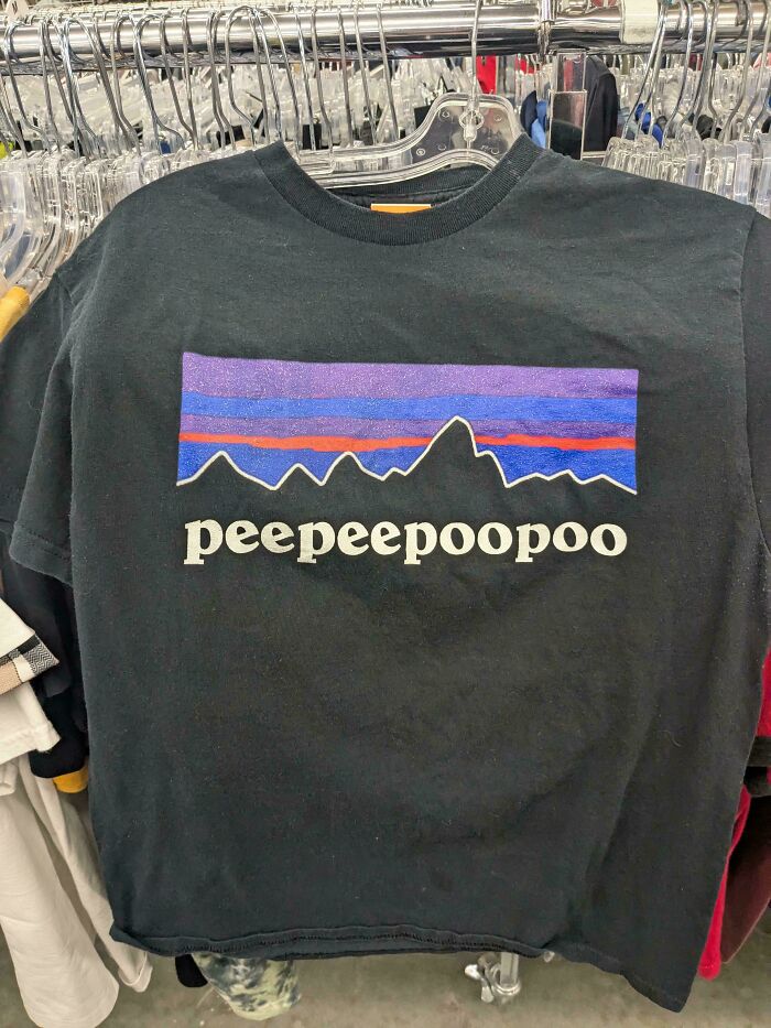 Black t-shirt with colorful abstract design found while thrifting.