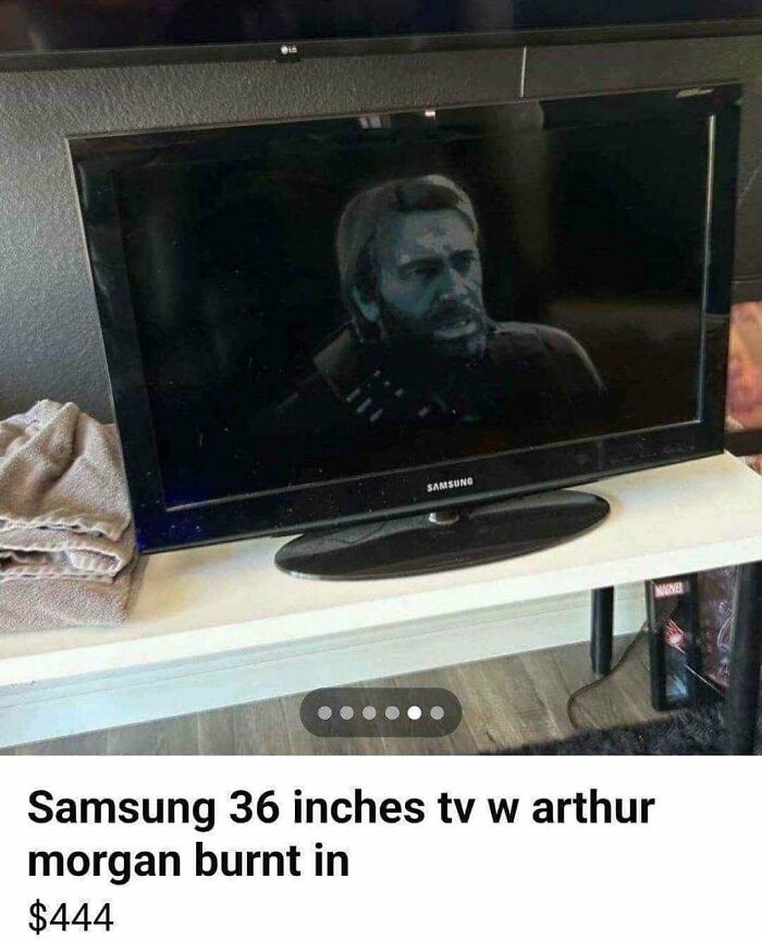 Samsung 36-inch TV showing a burnt-in image of Arthur Morgan from a video game on the screen.