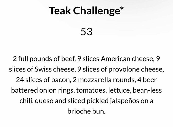 Teak Challenge dish with multiple cheese slices, beef, bacon, mozzarella, onion rings, and toppings on brioche bun.