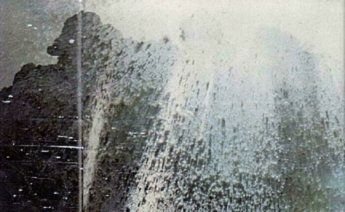 A rare historical photo showing the eruption of Mount Vesuvius, with ash and smoke filling the sky.