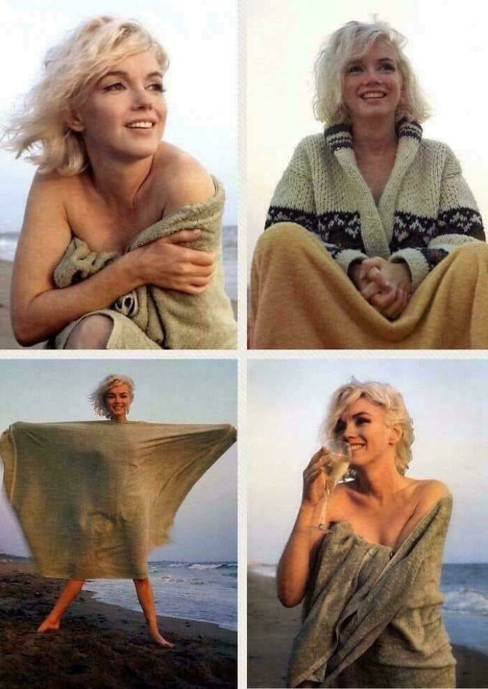 A woman in a towel on the beach, representing rare historical photos with a joyful expression.