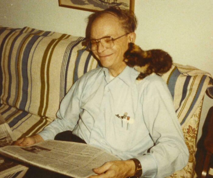 My Grandpa Trying To Read The Newspaper With A Kitten Sitting On His Shoulder. Early 1980s