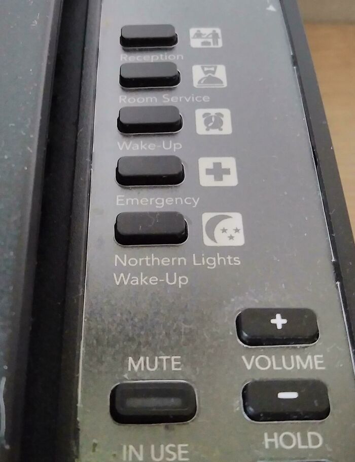 Buttons on a device featuring a "Northern Lights Wake-Up" option, subtly intriguing and unusual.