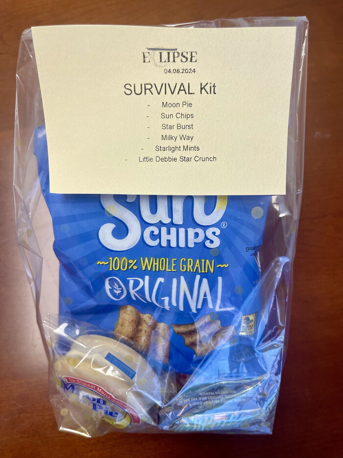 Eclipse survival kit with Sun Chips, Moon Pie, and other treats, showcasing mildly interesting items.
