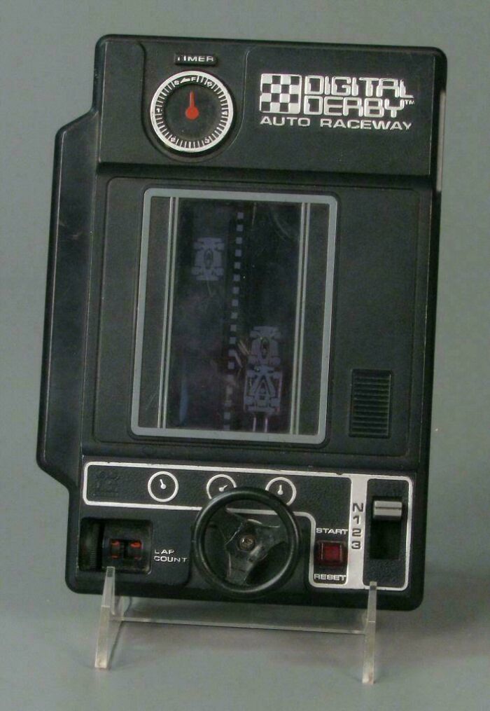 Vintage Digital Derby Auto Raceway handheld game console.