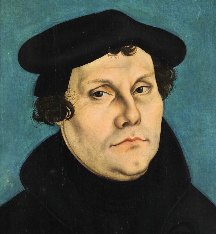 Portrait of a historical figure wearing a black hat and robe, associated with past future predictions.