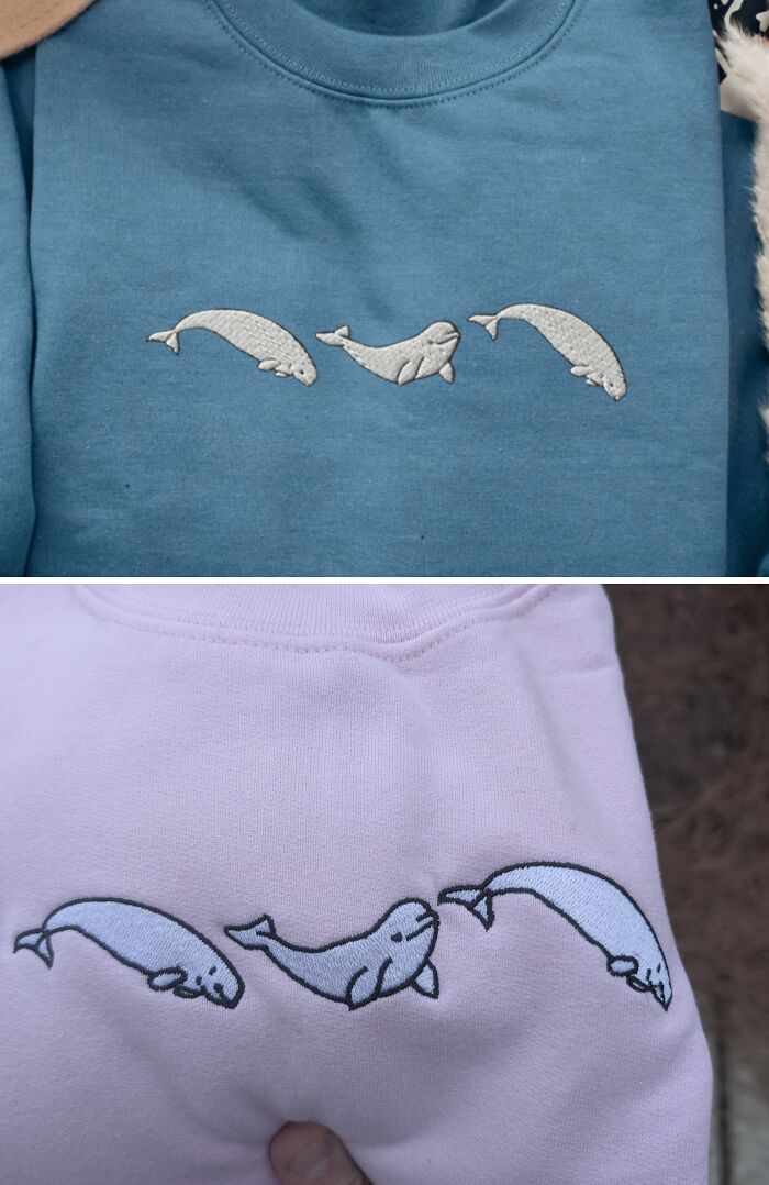 Blue and pink sweaters with incorrectly aligned whale embroidery, illustrating a Valentines Day fail.