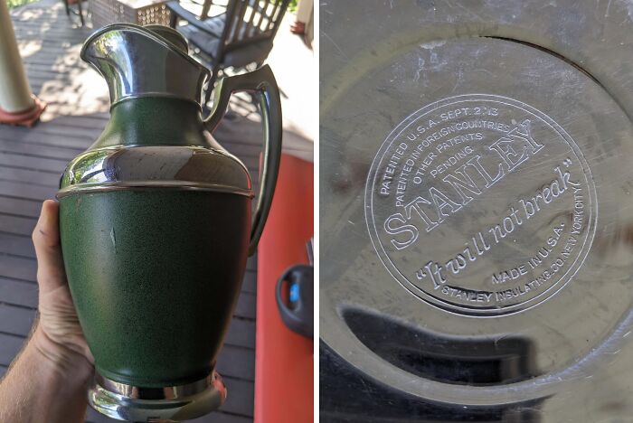 A hand holding a vintage Stanley thermos jug, showcasing the bottom engraving. Cool-old-things collectible item.