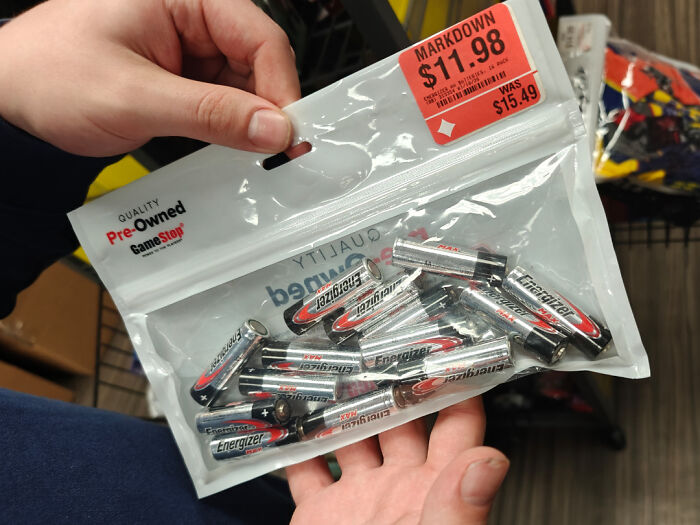 Bag of pre-owned Energizer batteries with markdown price, offering temperate amusement.
