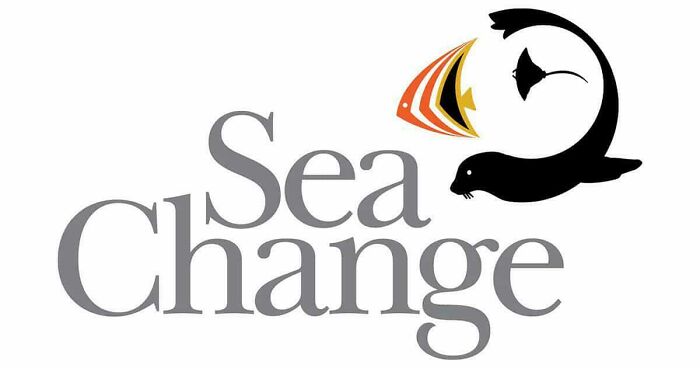 Sea Change logo with stylized fish, manta ray, and seal integrated into the design, showcasing smart and cool design.