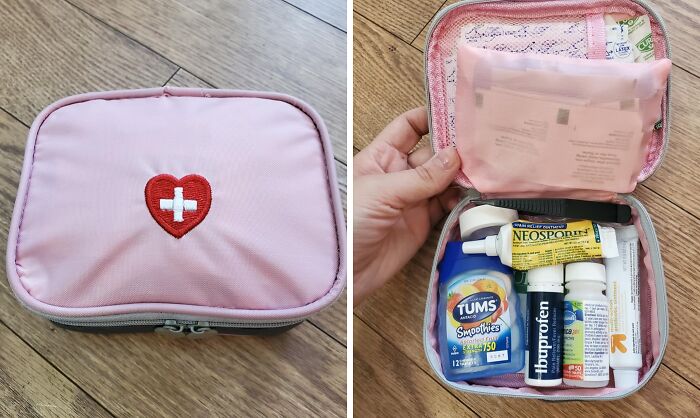 Travel items: pink first aid kit with various medications and supplies.