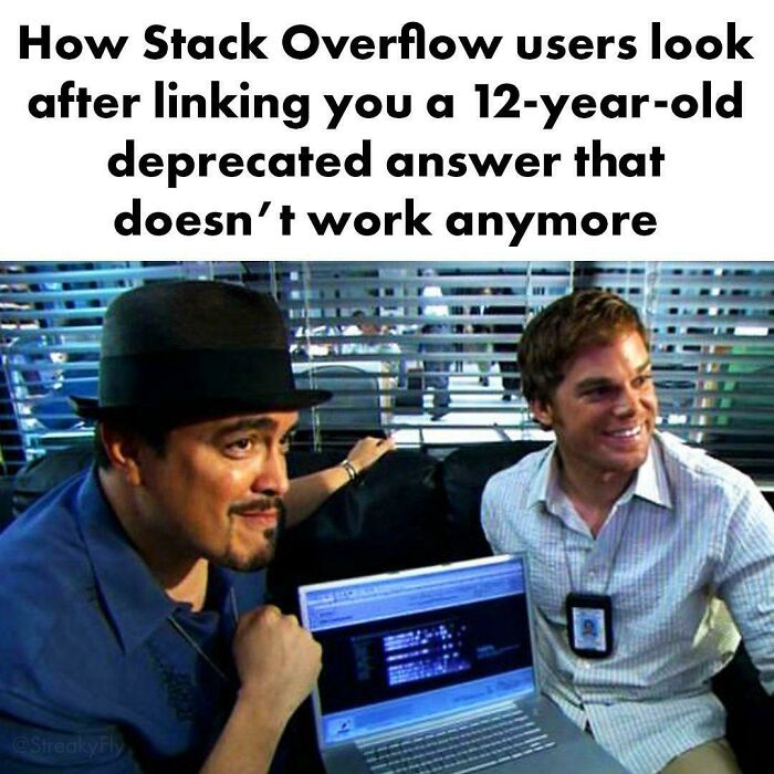 Two men look amused in an office setting, referencing outdated Stack Overflow answers; meme for programmers.