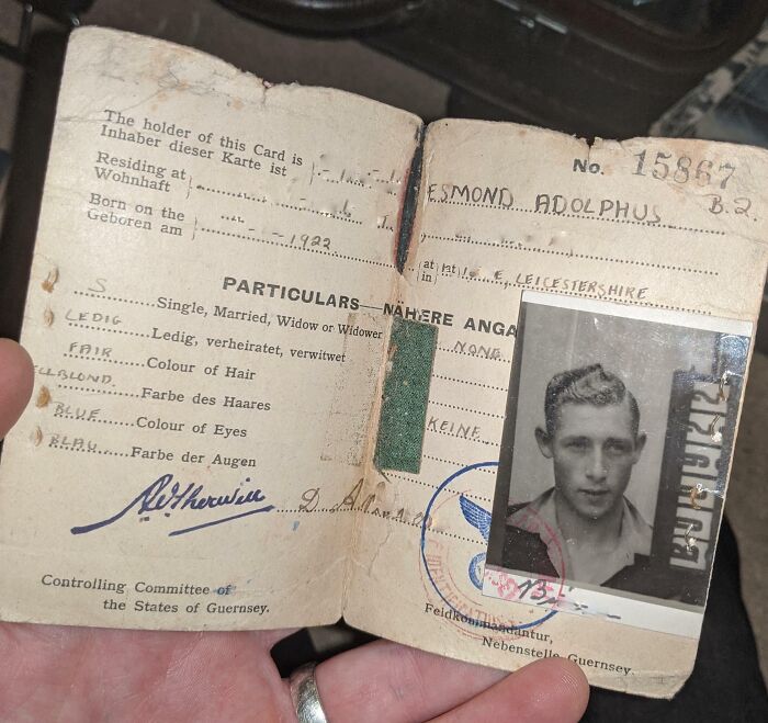 An old identification card with a black and white photo, showcasing Cool-Old-Things.