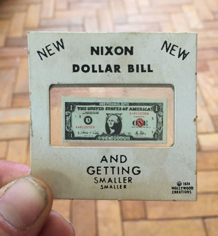 A novelty Nixon dollar bill encased in a frame, representing Cool-Old-Things with unique vintage charm.