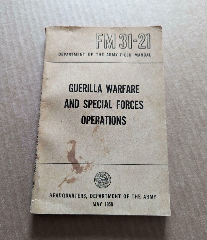 Old Department of the Army manual, FM 31-21, titled "Guerilla Warfare and Special Forces Operations," dated May 1958.