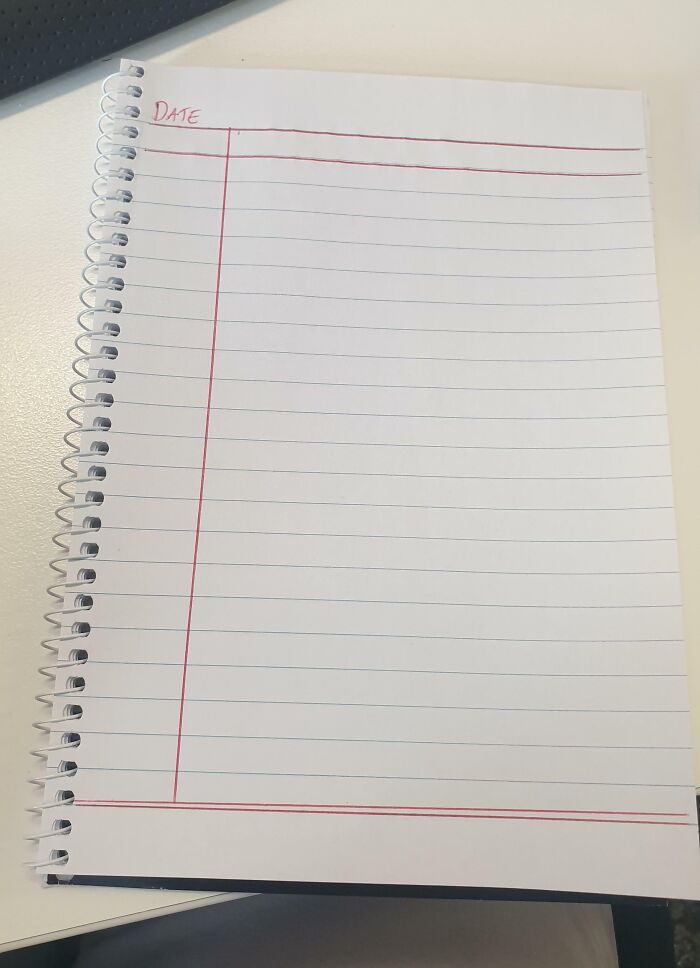 Spiral-bound notebook with red margin lines, reminiscent of old-school items and memories.