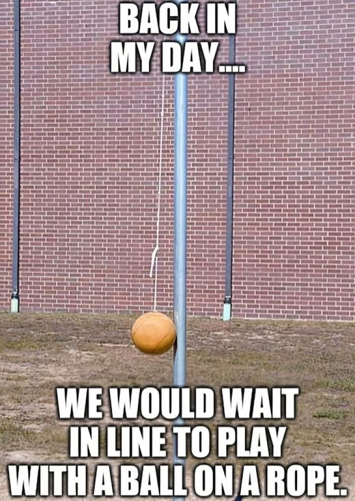 Old-school memories with a tetherball in a playground setting against a brick wall.