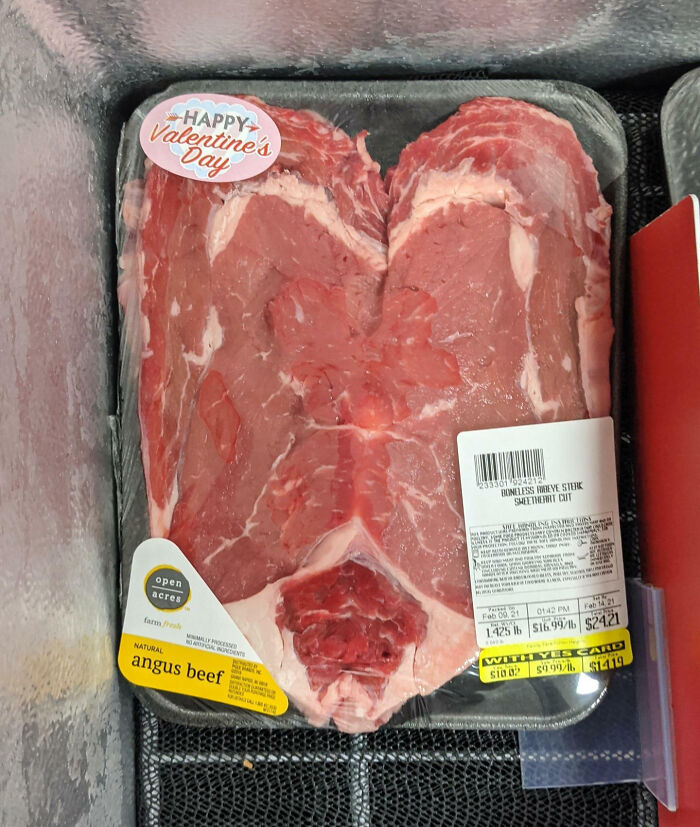 Heart-shaped angus beef steak with Valentine's Day sticker, creative gift inspiration.
