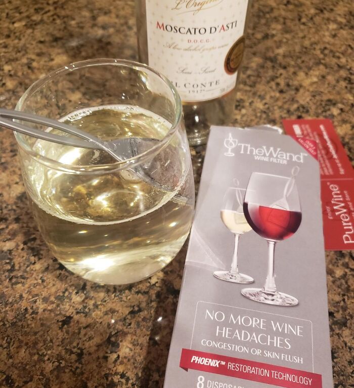 Wine filter and glass of Moscato d'Asti for long term couples enjoying V-Day.