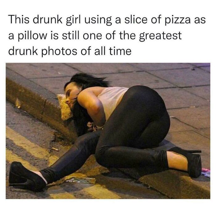 Woman humorously using pizza as pillow on street, illustrating strange and funny moments in community.