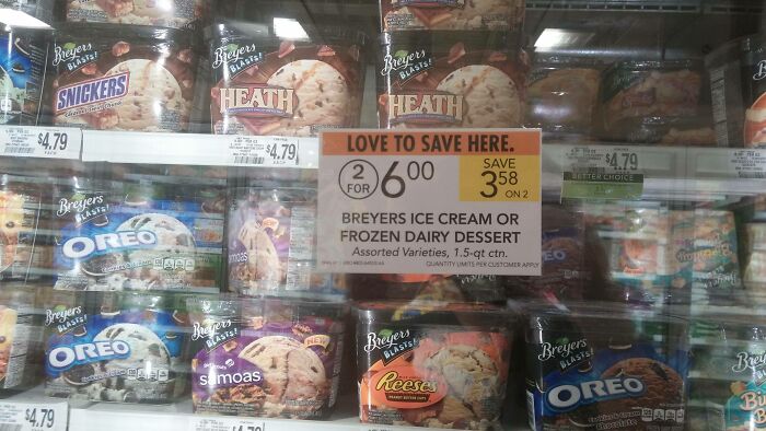 Breyer's ice cream sale with various flavors displayed in a grocery store, showcasing a grocery-shopping-hacks discount.