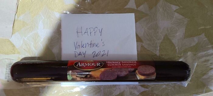 Valentine's gift featuring a hickory smoked summer sausage with a handwritten note saying "Happy Valentine's Day 2021".