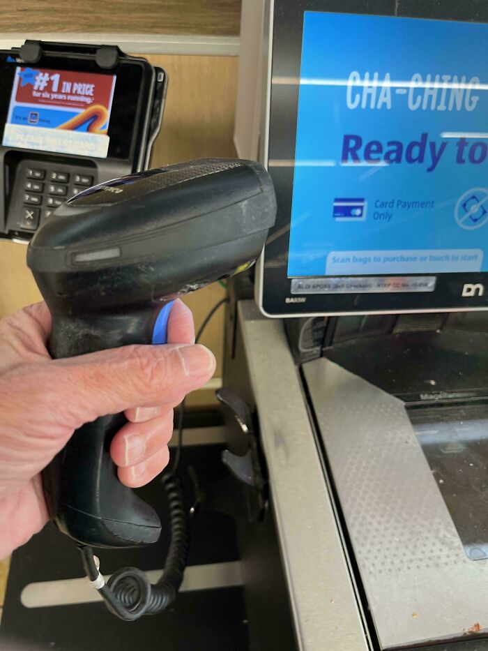 "Self-checkout scanner in use, illustrating grocery-shopping-hacks for quick and efficient checkout."