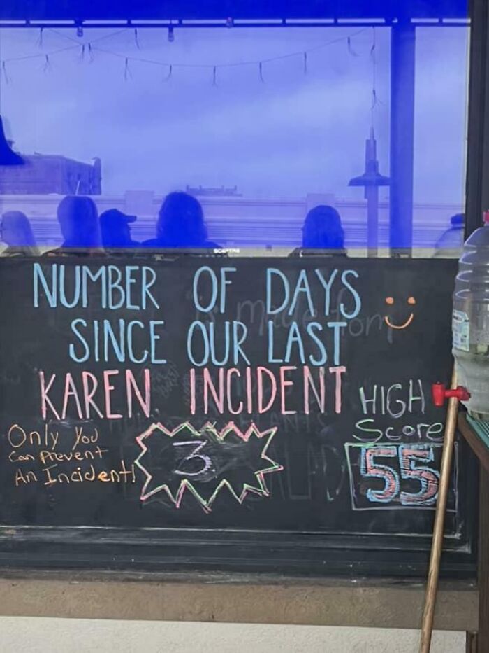 Chalkboard in Florida cafe humorously tracks days since last "Karen" incident, showing current and high scores.