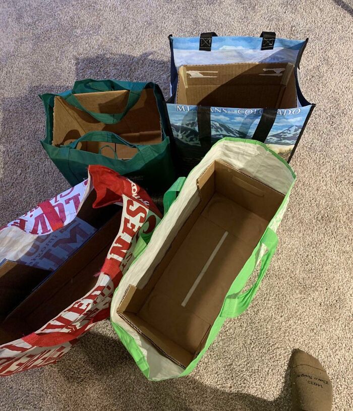Reusable grocery bags with cardboard inserts for stability, showcasing a practical grocery-shopping-hack.