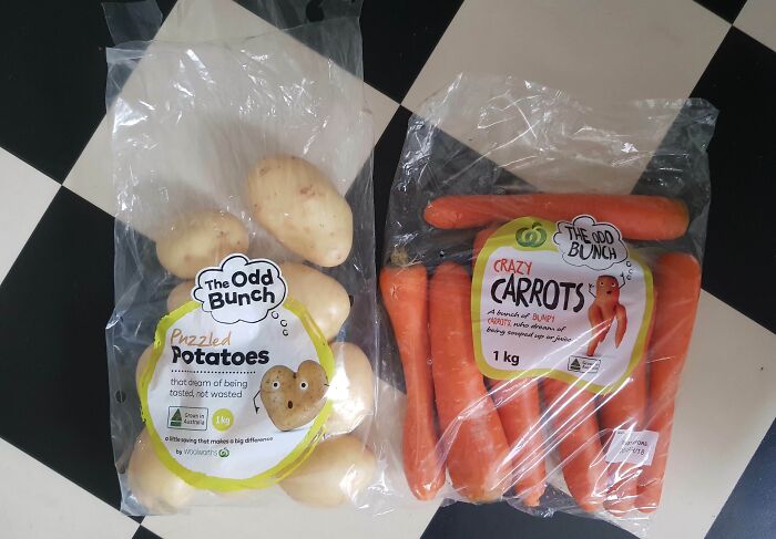 Odd-shaped potatoes and carrots in bags on a checkered floor, highlighting grocery-shopping-hacks for reducing waste.