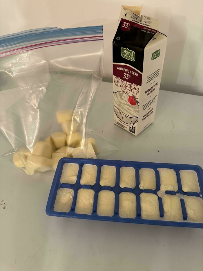 Frozen whipping cream cubes in ice tray and plastic bag as grocery-shopping-hacks.