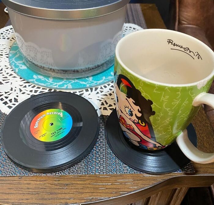 Betty Boop mug on a vinyl record coaster with another record coaster nearby, showcasing affordable budget finds under $5.