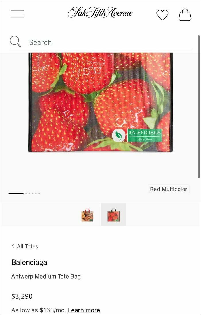 Balenciaga tote bag with strawberry design, priced at $3,290, epitomizing consumerism.