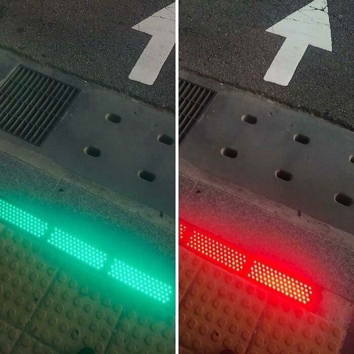 Ground-level traffic lights with green and red lights, illustrating cities-genius-solutions for pedestrian safety.