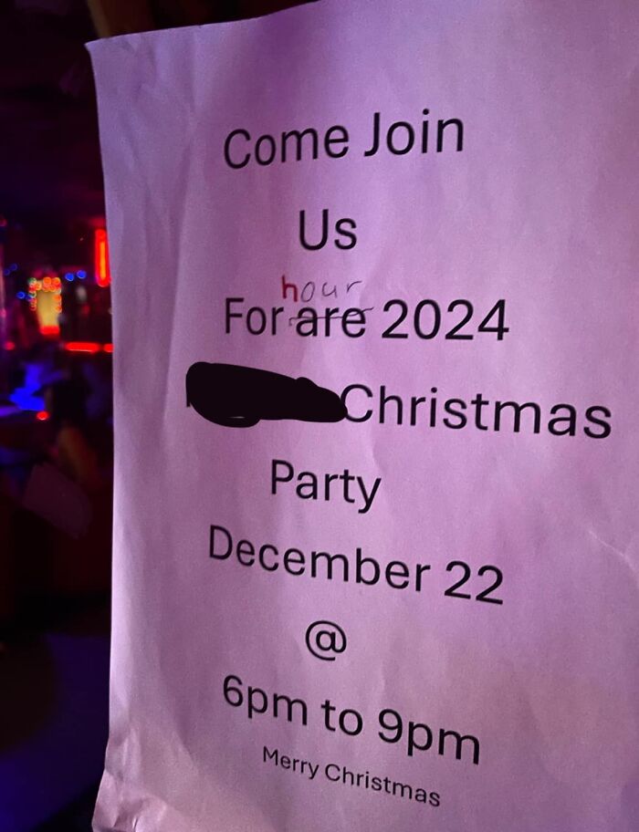 Sign with corrected text for 2024 Christmas party details, showing a humorous error correction.