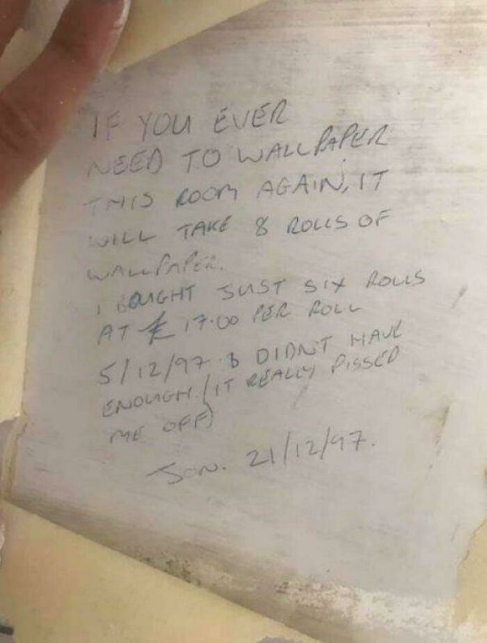 Handwritten note about needing 8 wallpaper rolls, found during renovation; something interesting and unseen before.