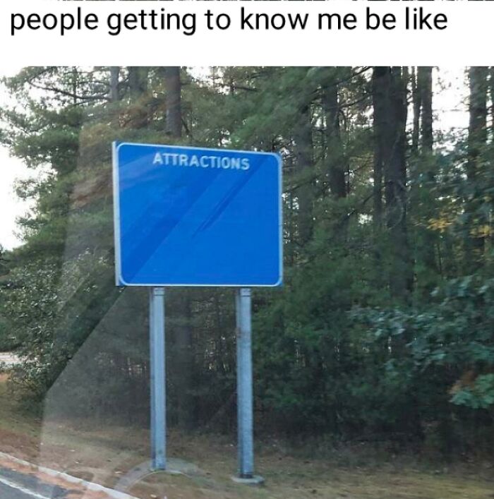 Blank attractions sign symbolizing existential memes, surrounded by trees, with the caption "people getting to know me be like."