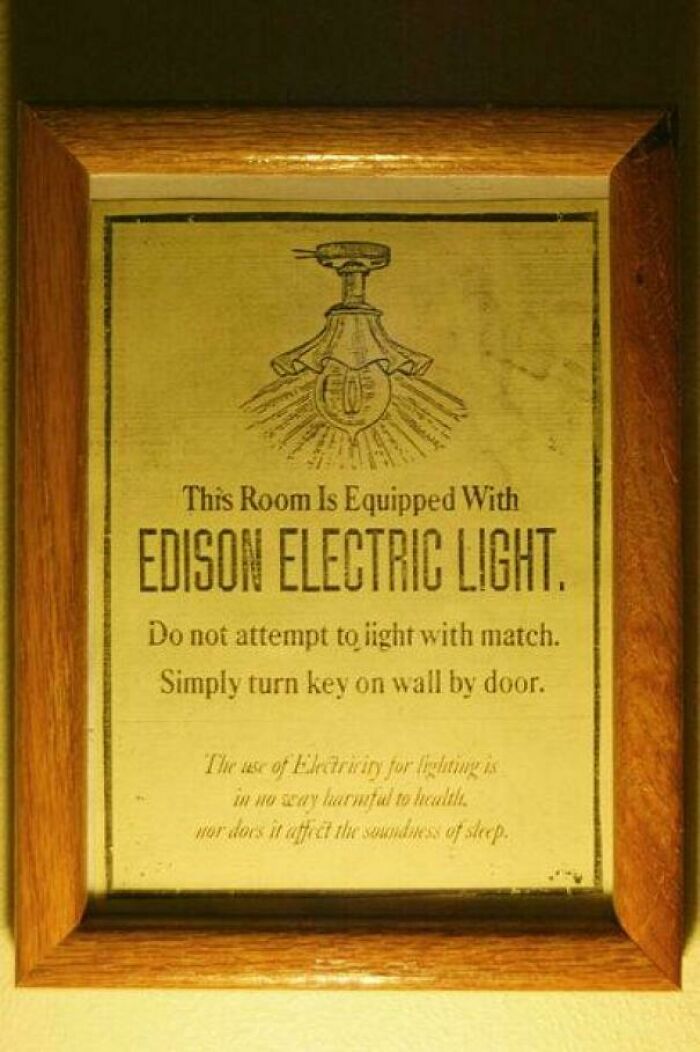 Framed sign explaining the use of Edison Electric Light, warning against lighting with a match, something interesting.