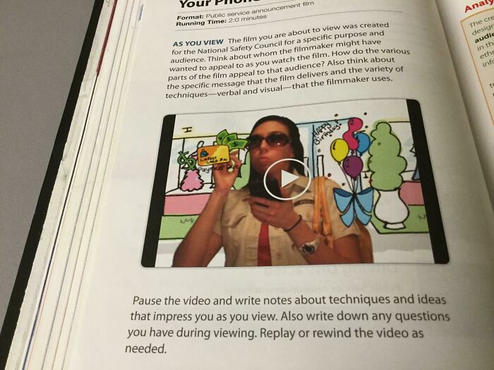 Poorly written designed books featuring a PSA film scene with a woman holding a card in front of a colorful backdrop.