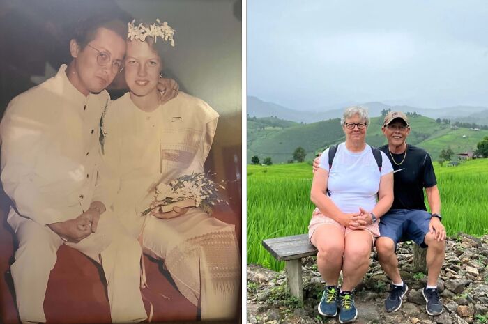Couple recreating a past wedding photo, now sitting on a bench in a lush, green landscape, wearing casual clothes.