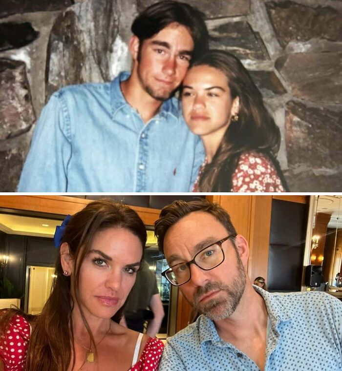 Two people recreating a past photograph, showcasing a then and now comparison.