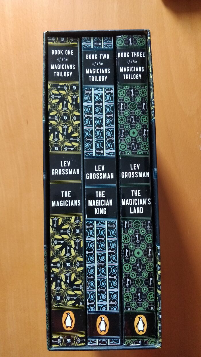 Set of three colorfully designed books in a box.