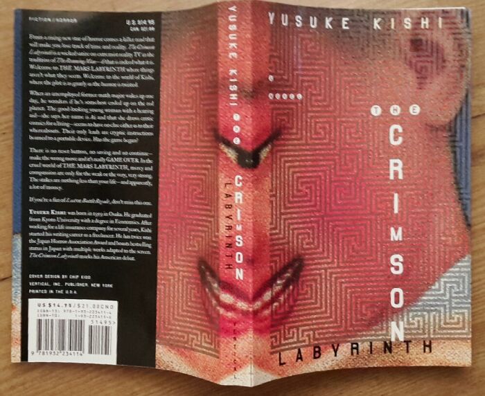 Poorly designed book cover featuring "The Crimson Labyrinth" by Yusuke Kishi with intricate patterns and bold text.