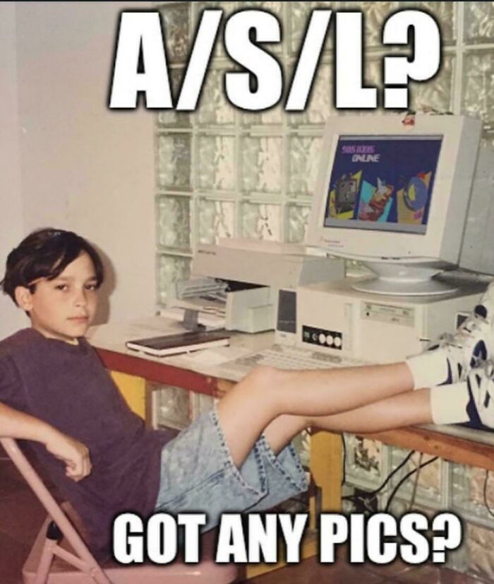 Boy in '90s style with retro computer and meme text.