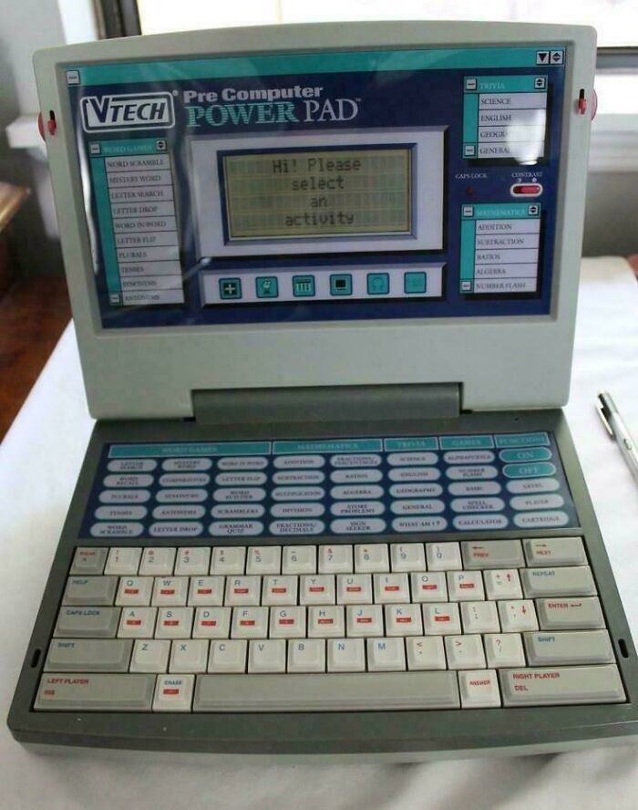 Vintage '90s VTech Power Pad with a keyboard and interactive screen, showcasing retro educational technology.