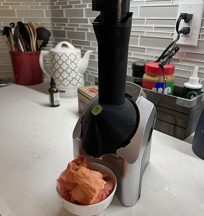 A clever invention for making healthy fruit sorbet easily at home, placed on a kitchen counter.