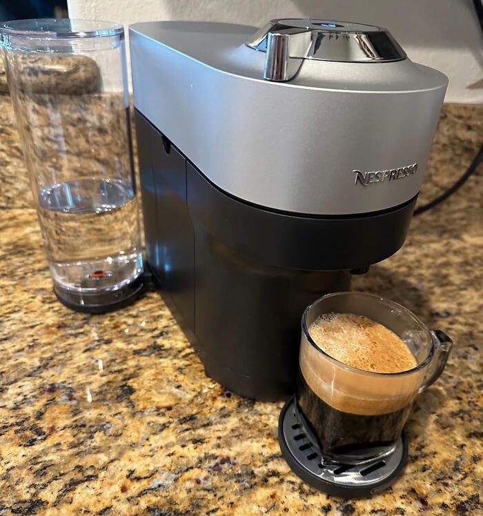 Espresso machine on granite countertop, brewing a fresh cup, illustrating long-term value.